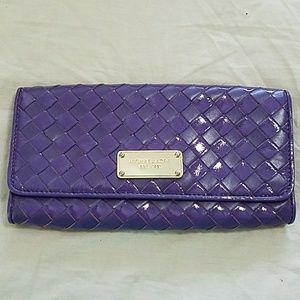 Micheal Kors purple clutch